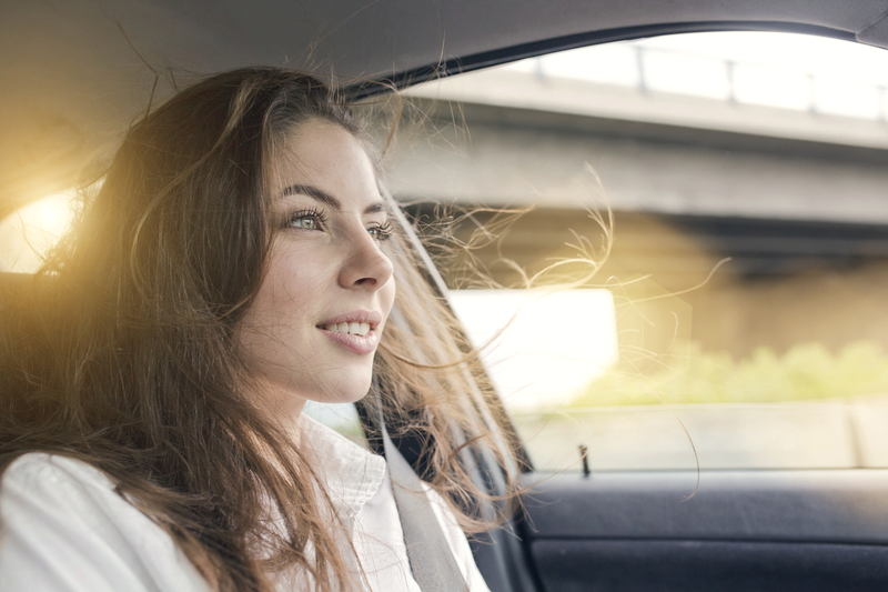 Young_woman_in_car.png