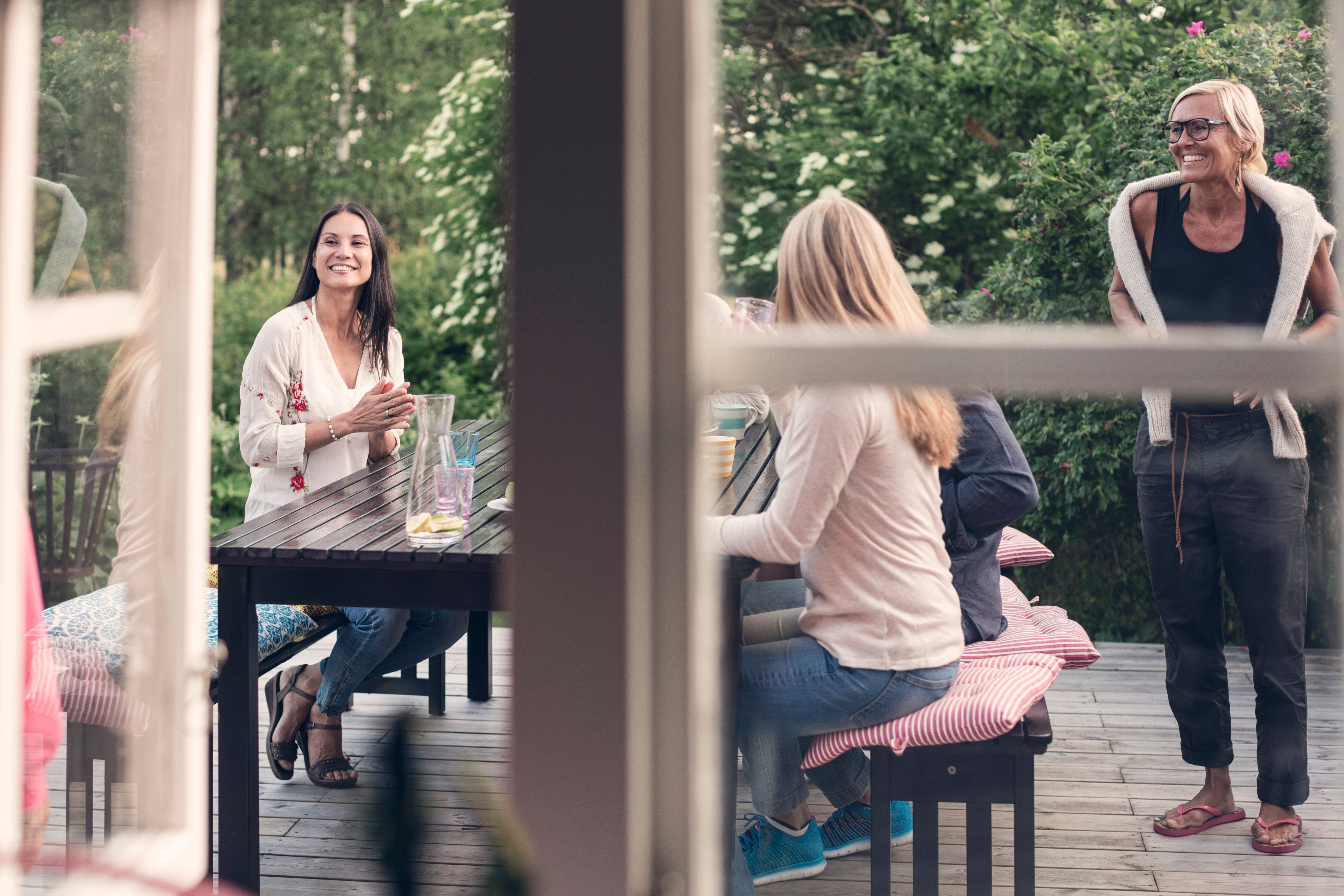 Family_and_friends_hanging_out_on_the_porch.jpg